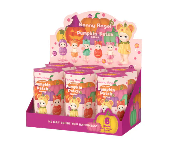 Display of Sonny Angel Pumpkin Patch series packaging with dolls in costumes.